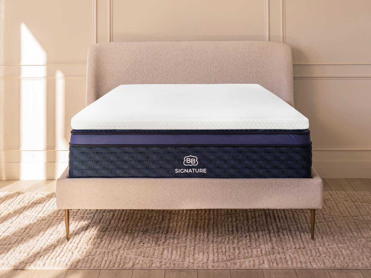 bedroom with  Brooklyn Bedding 4-lb Memory Foam Topper on a mattress