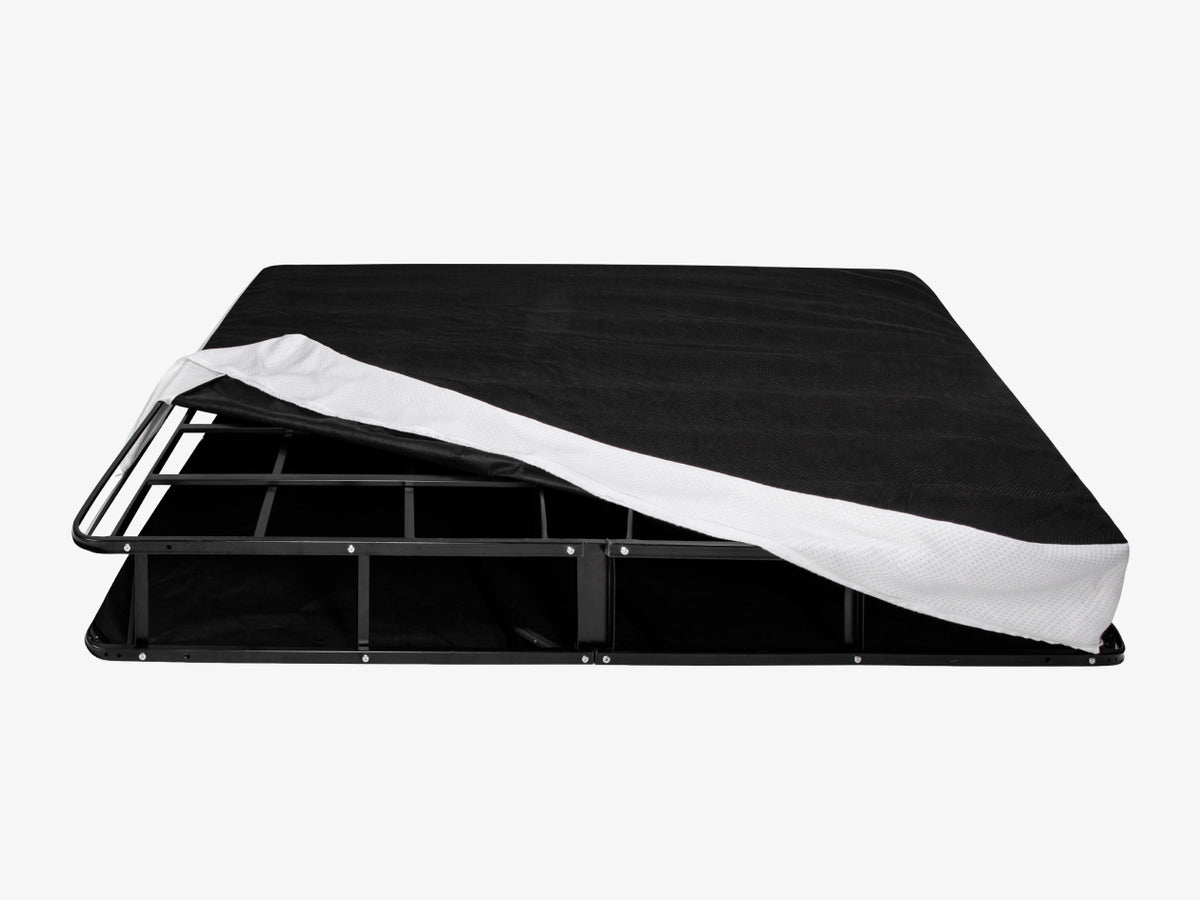 Brooklyn Bedding Ascension® Bi‑Fold Foundation with cover off corner showing metal