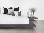 Lifestyle bedroom scene of Brooklyn Bedding Mattress Protector on mattress