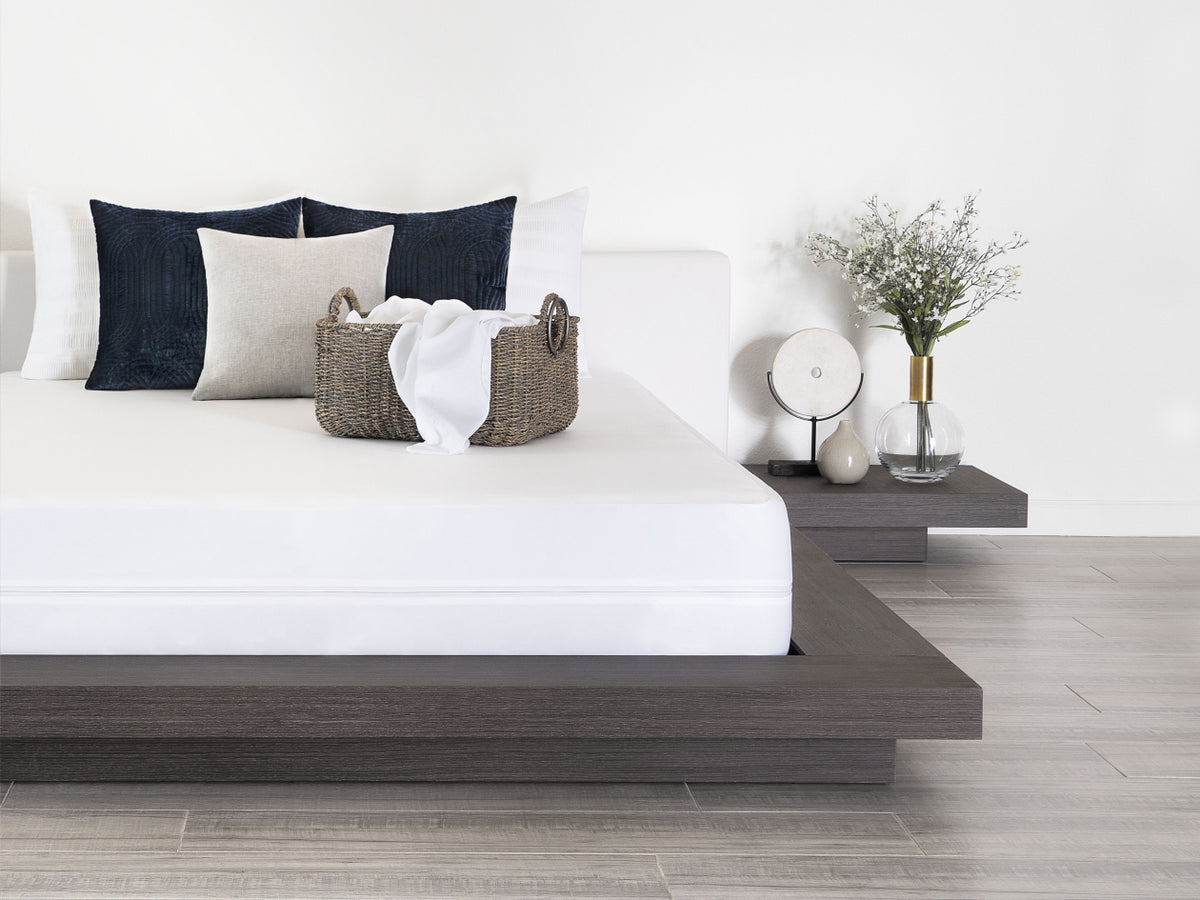 Lifestyle bedroom scene of Brooklyn Bedding Mattress Protector on mattress