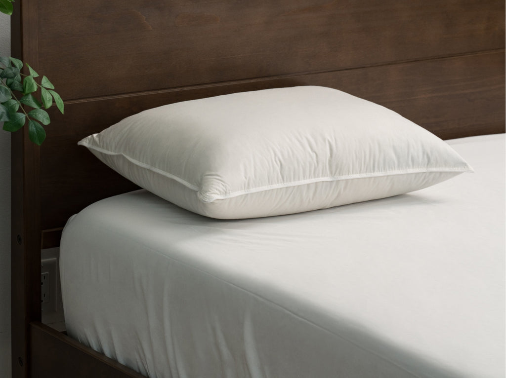 lifestyle bedroom scene with Brooklyn Bedding Feather & Down Comfort Pillow