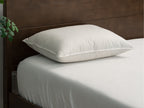 lifestyle bedroom scene with Brooklyn Bedding Feather & Down Comfort Pillow