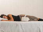 Brooklyn Bedding Knee Pillow used by woman laying down on her side