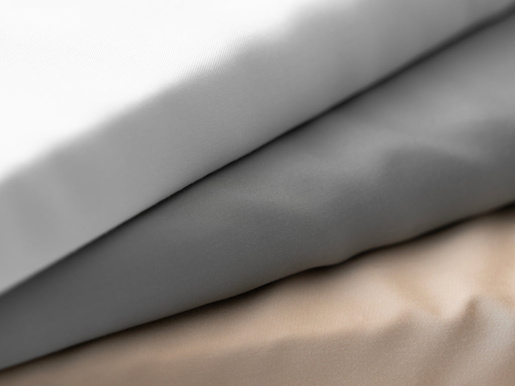 Brooklyn Bedding Deep Pocket Tencel Sheets Close up of three color options white, Silver and Khaki.