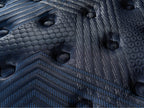 Brooklyn Bedding ThermoBalance Mattress close-up of the dark blue quilted surface with stitched geometric and hexagon patterns.