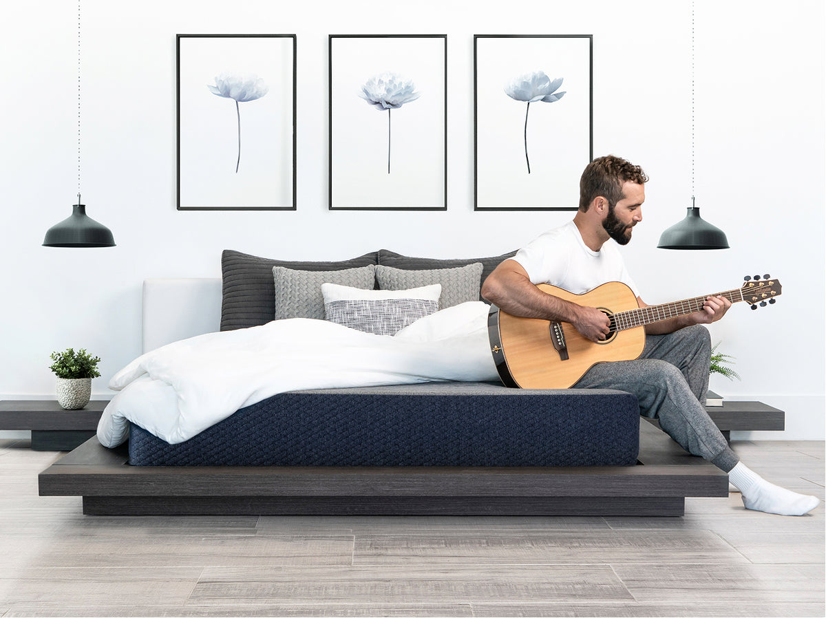  Brooklyn Bedding Dreamfoam Essential scene with man and a guitar 