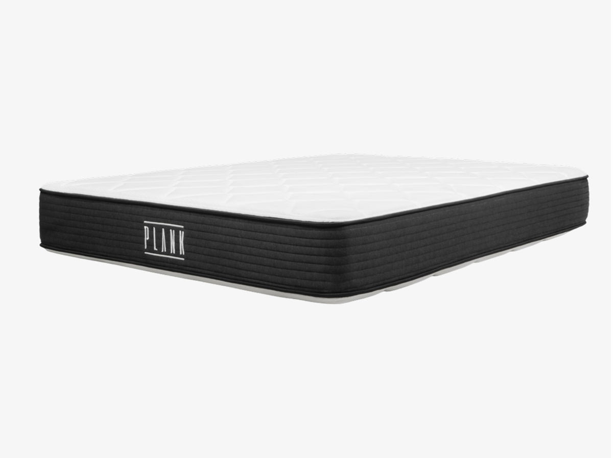 Brooklyn Bedding Plank Firm Mattress angled on a light gray background.