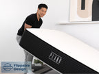 Brooklyn Bedding Plank Firm Luxe mattress being lifted by one person, with a badge reading “Flippable Design.”