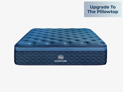 Front view of the Brooklyn Bedding Signature Hybrid with pillow top upgrade on a light gray background, with a badge reading “Upgrade To The Pillowtop.”