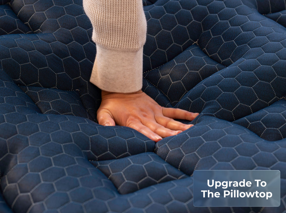 Hand on Signature pillowtop showing upgrade option