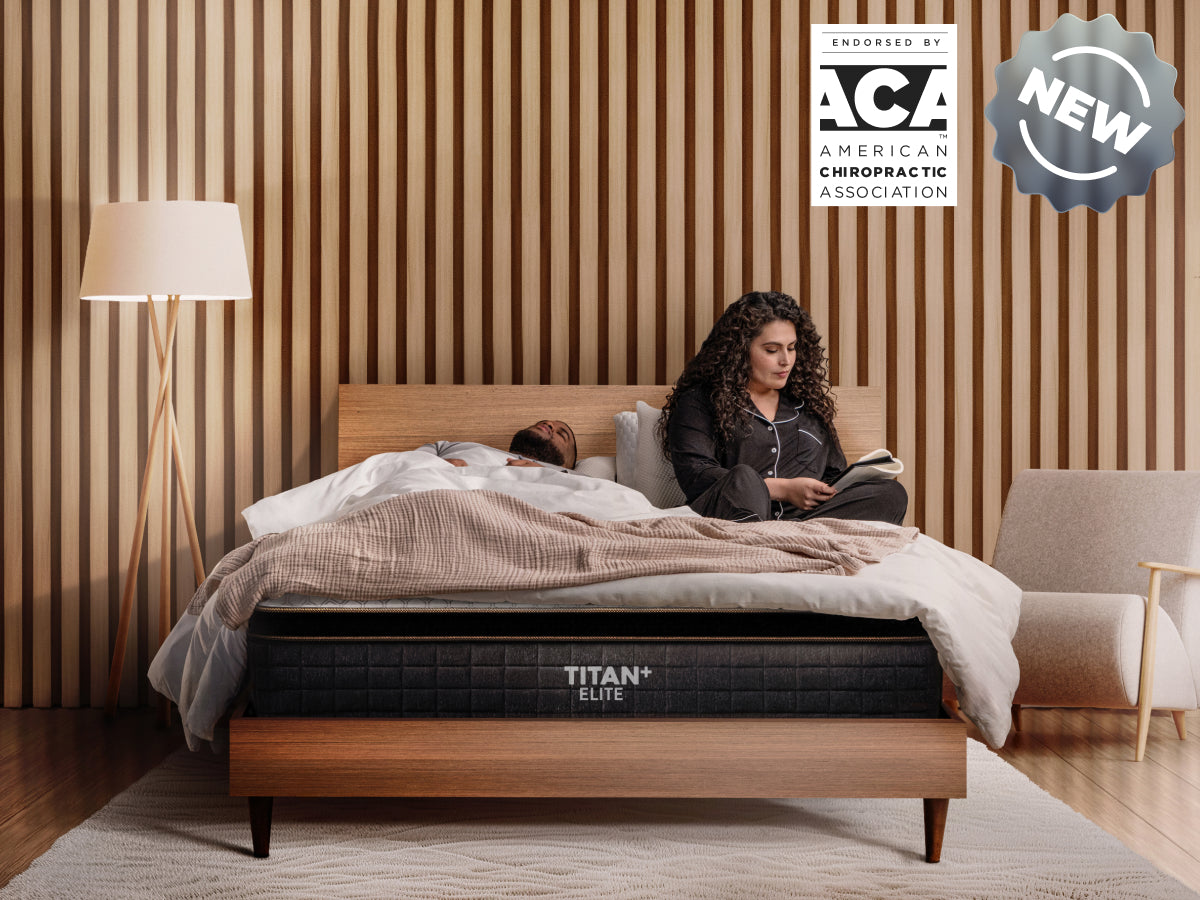 Product shot with two people, Titan Plus Elite mattress with new badge, ACA American Chiropractic association badge
