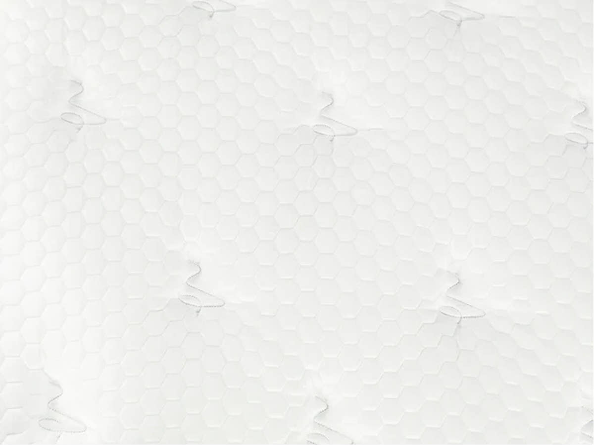 close up shot of top tufted fabric for Titan Plus Luxe with cooling hexagon shapes