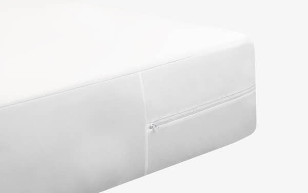 Lifestyle bedroom scene of Brooklyn Bedding Mattress Protector on mattress