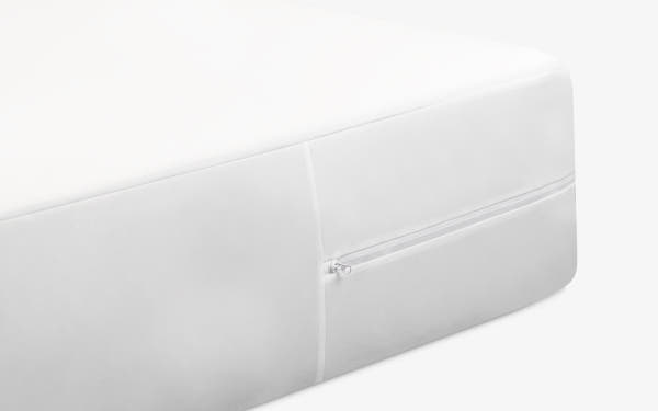 lifestyle bedroom scene of kid sleeping on Brooklyn Bedding Kids Mattress Encasement
