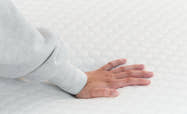 Hand press of  Brooklyn Bedding Microcoil Mattress Topper
