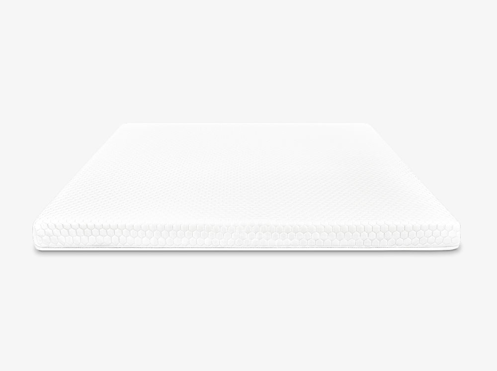 Front view of a white mattress topper with hexagon quilted cover on a neutral background.