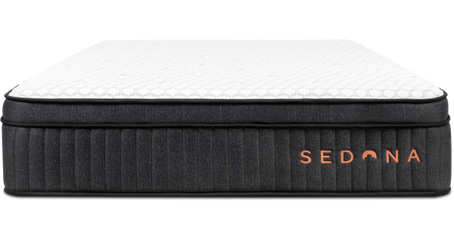Sedona Elite mattress with a couple leaning on the bed, with a badge reading “2023 Refinery29 Best Mattress.”