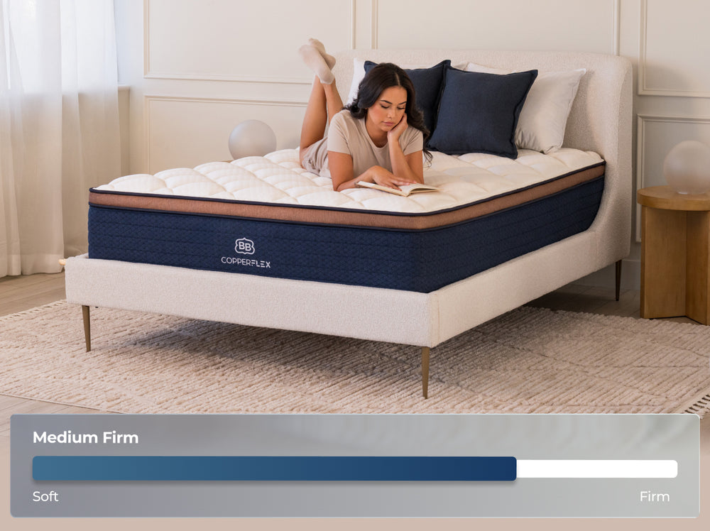 Woman on Copperflex Pro mattress showing firmness comfort